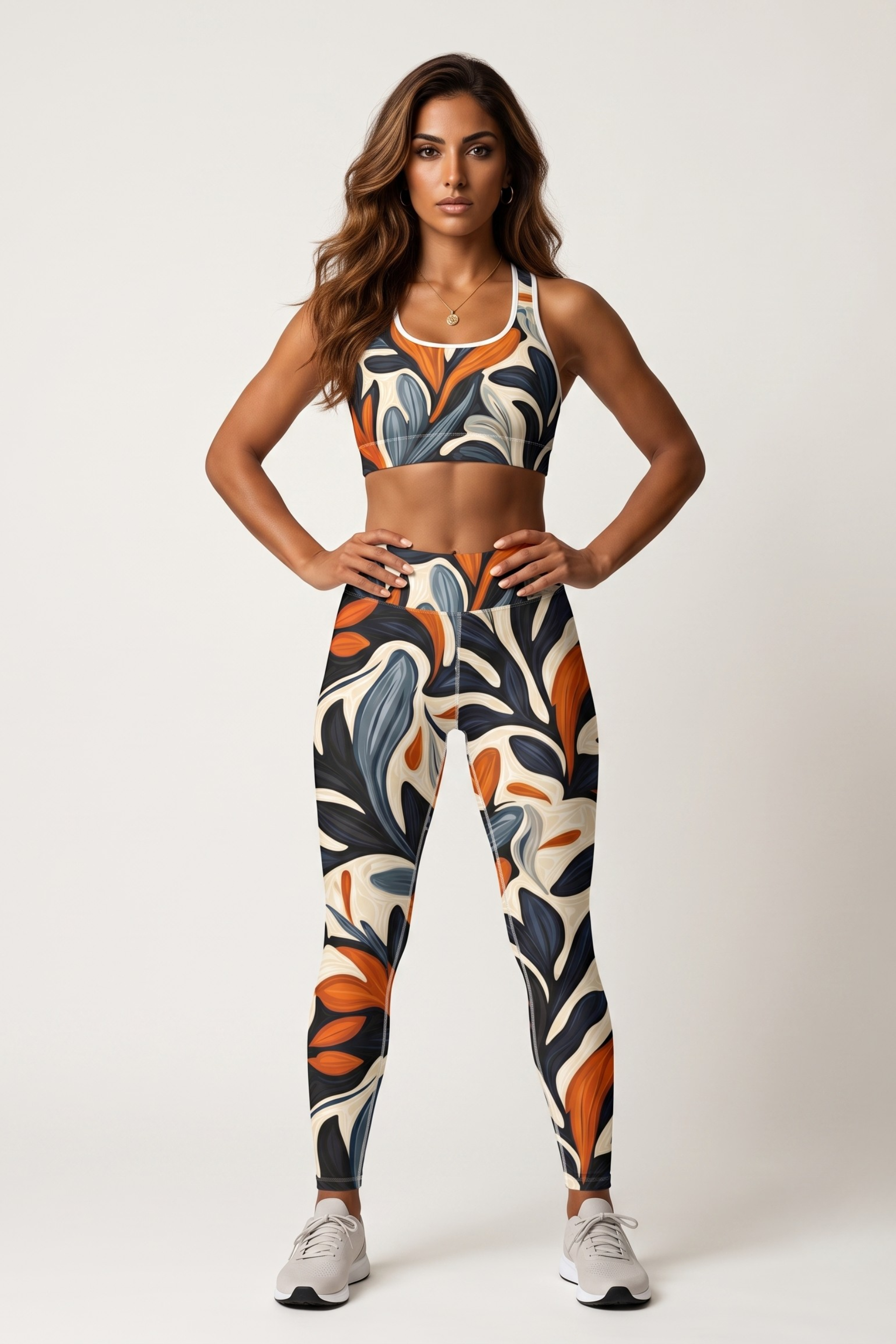 Woman wearing a colorful sports bra and leggings set on a white background